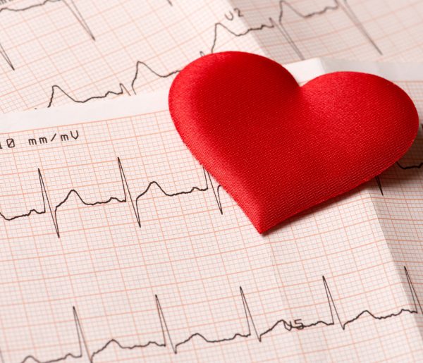 Cardiogram chart with red heart